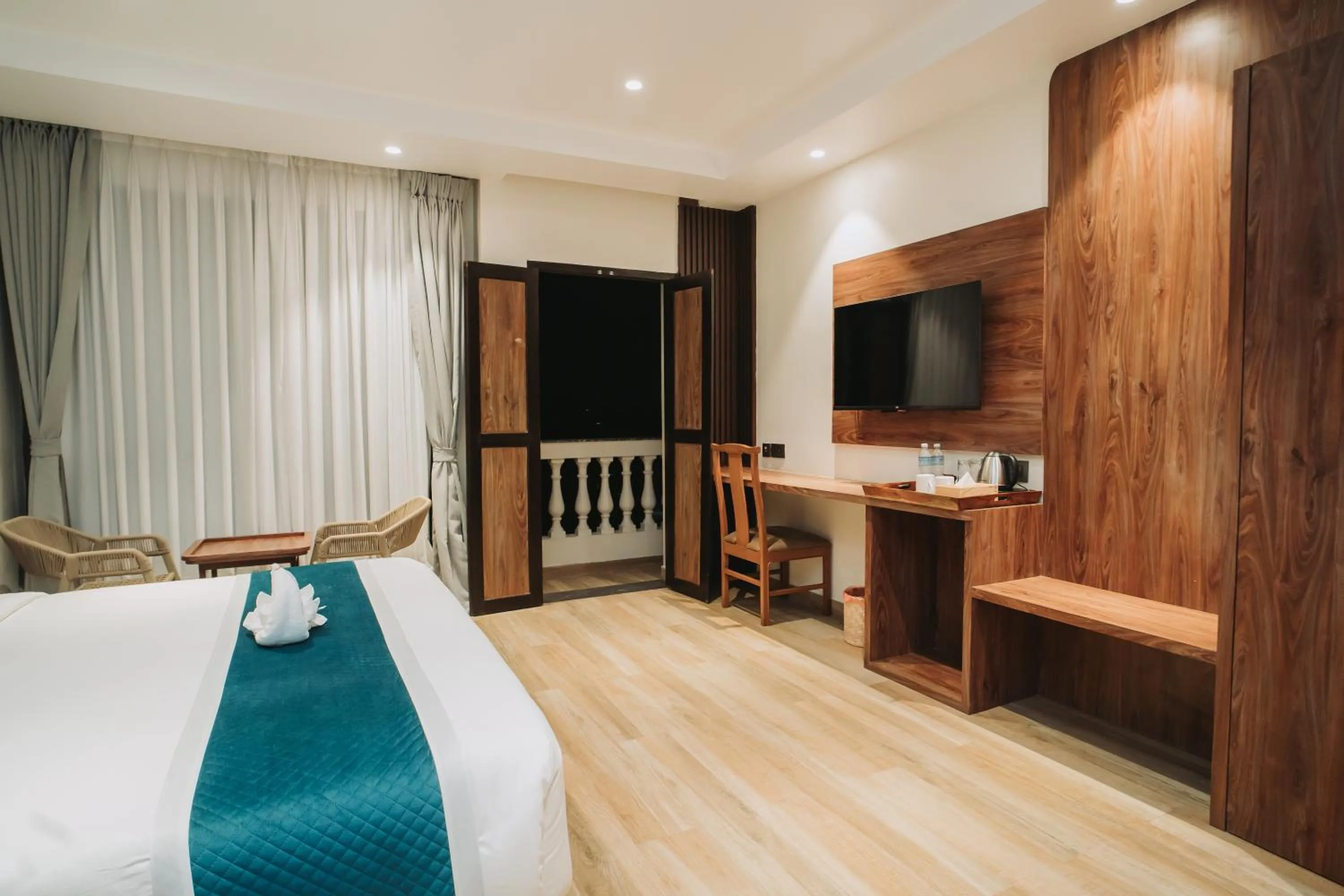 Bed in Dees Boutique Hotel