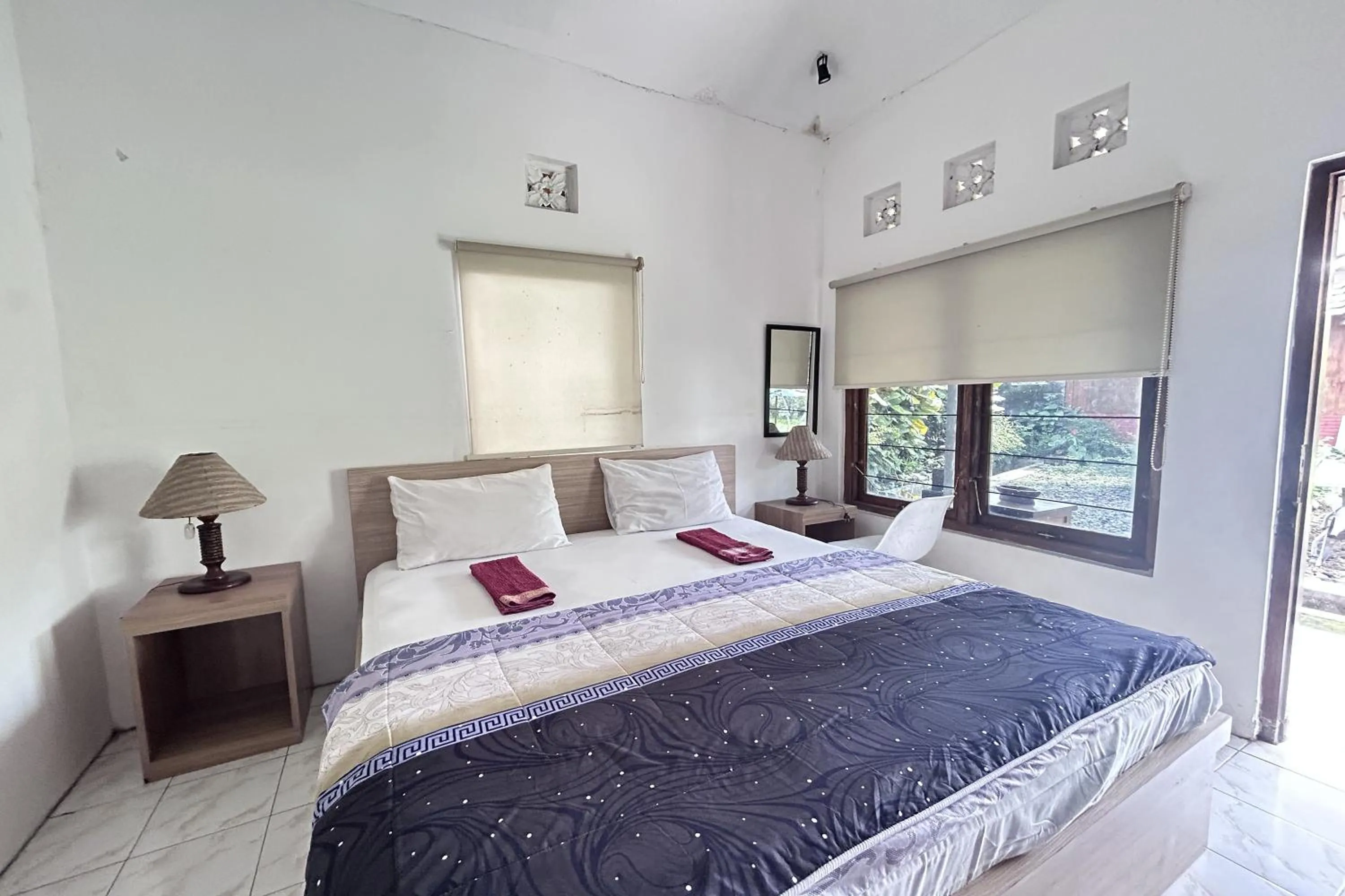 Photo of the whole room, Bed in Carla Garden