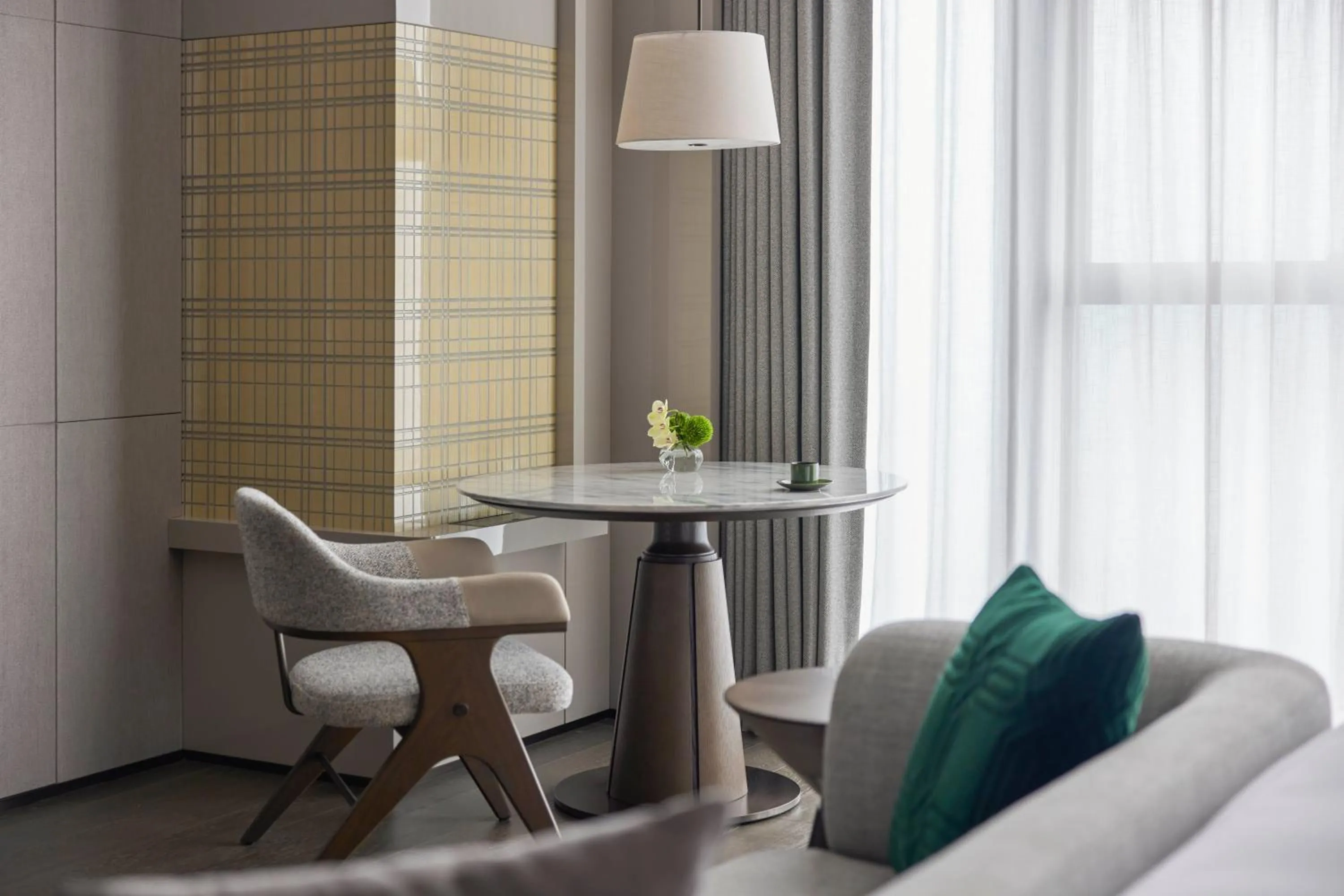 Seating area in Conrad Chongqing - Indulge in the magical 8D city landscape