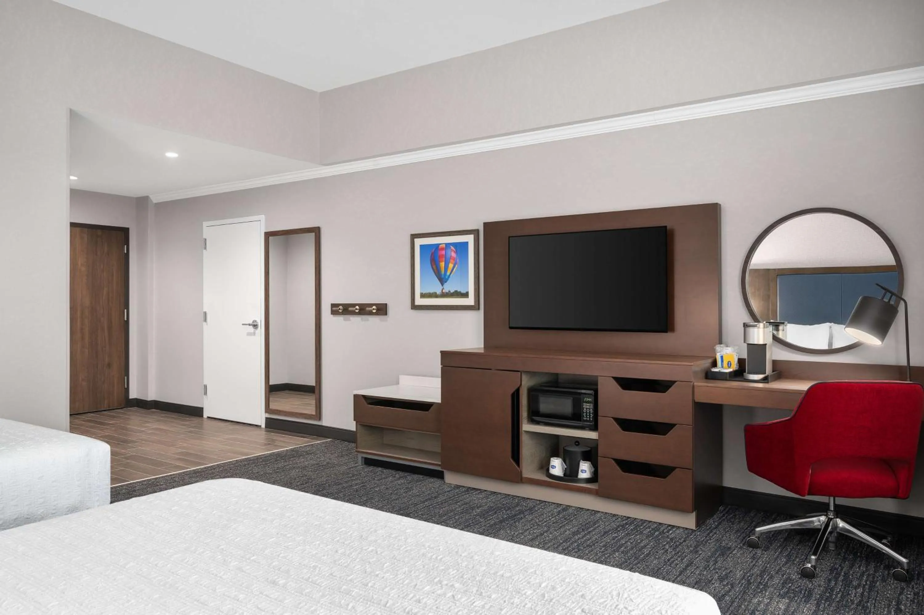 Bed in Hampton Inn & Suites by Hilton Pittsboro