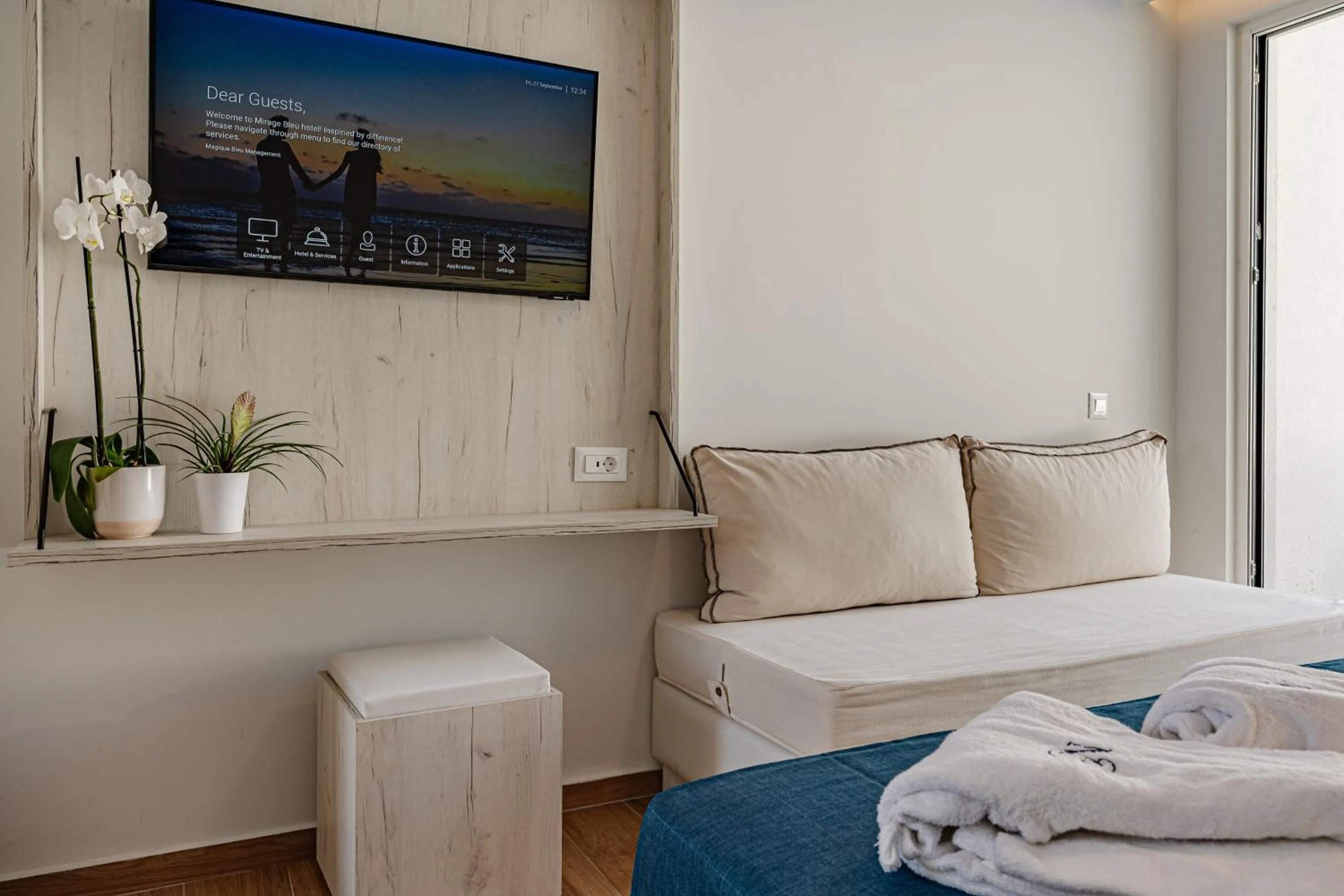 Bed in Magique Bleu Suites