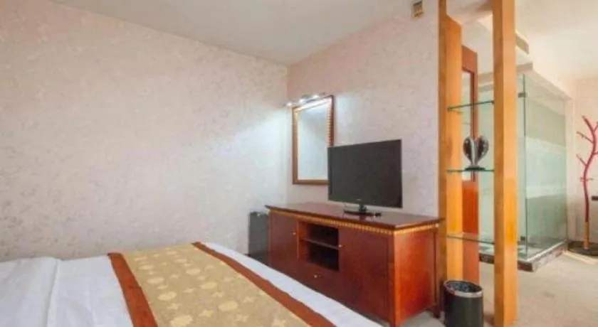 Bed in Nantong GuoDu Hotel