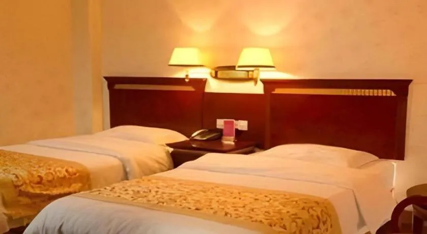 Bed in Nantong GuoDu Hotel