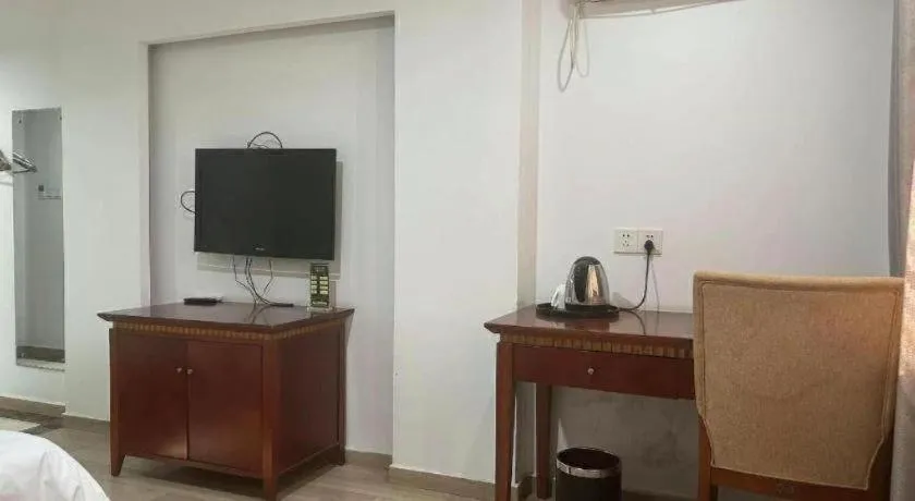 Bed in Nantong GuoDu Hotel