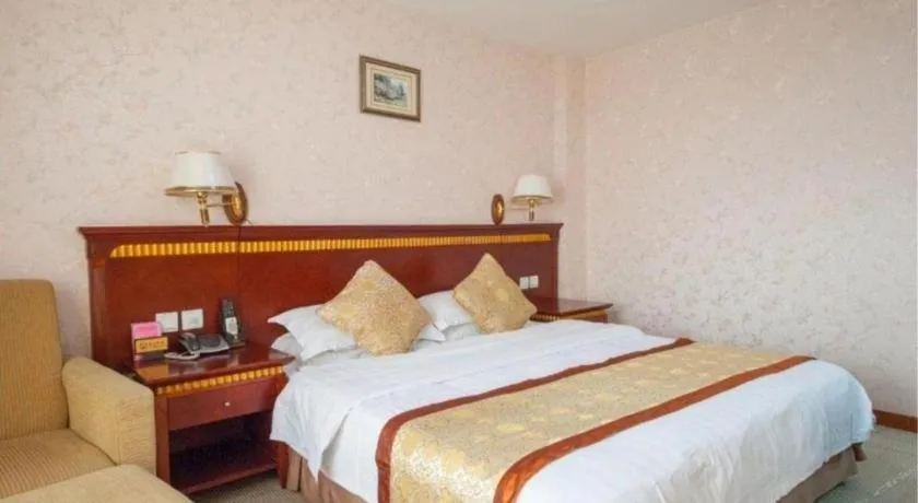 Bed in Nantong GuoDu Hotel