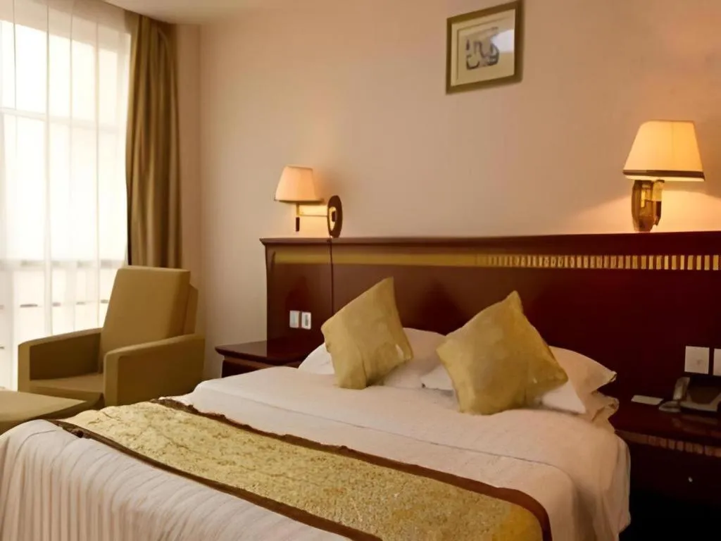 Bed in Nantong GuoDu Hotel