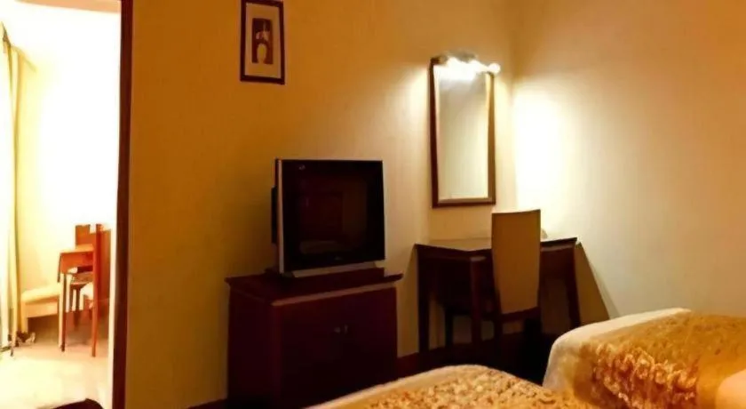 Bed in Nantong GuoDu Hotel