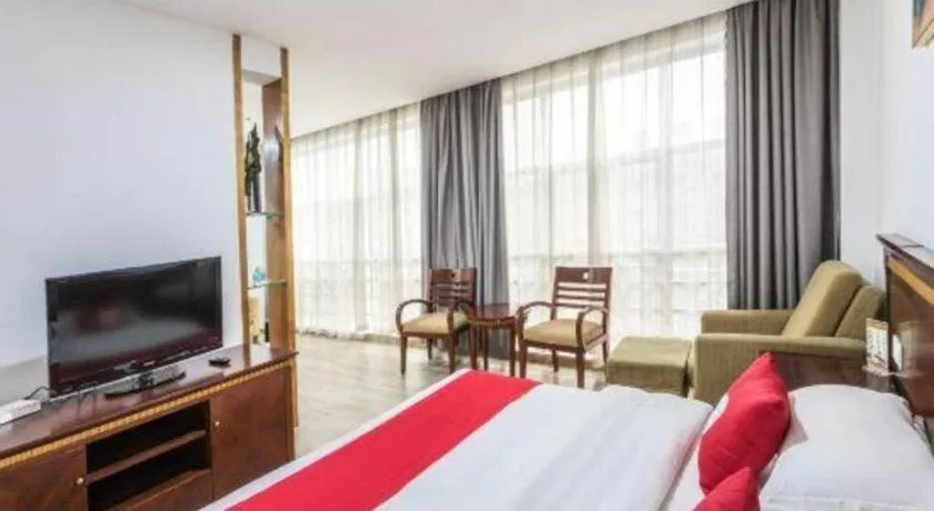 Bed in Nantong GuoDu Hotel