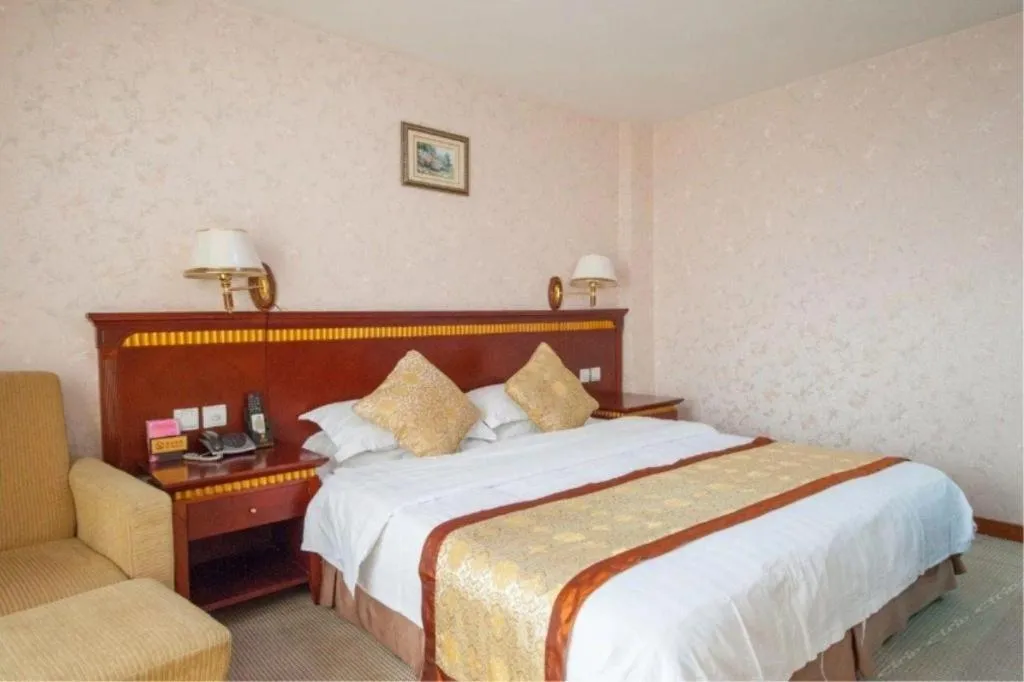 Bed in Nantong GuoDu Hotel