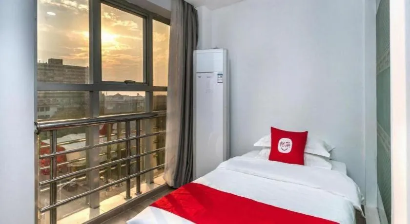 Bed in Nantong GuoDu Hotel