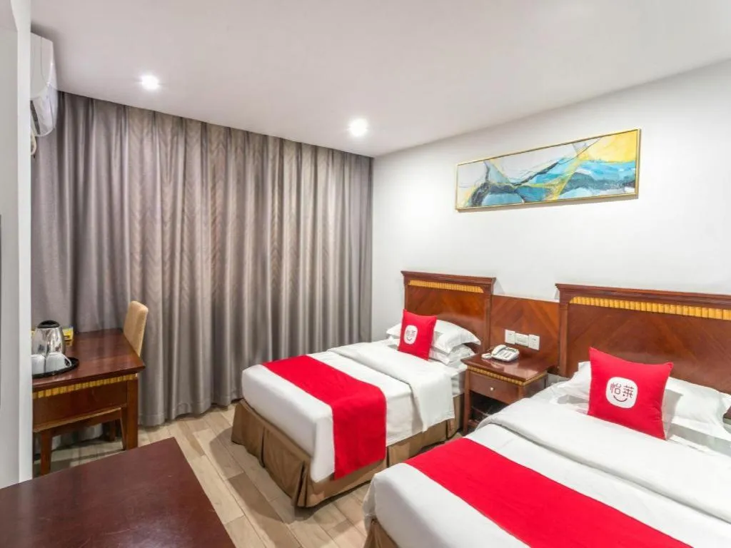 Bed in Nantong GuoDu Hotel