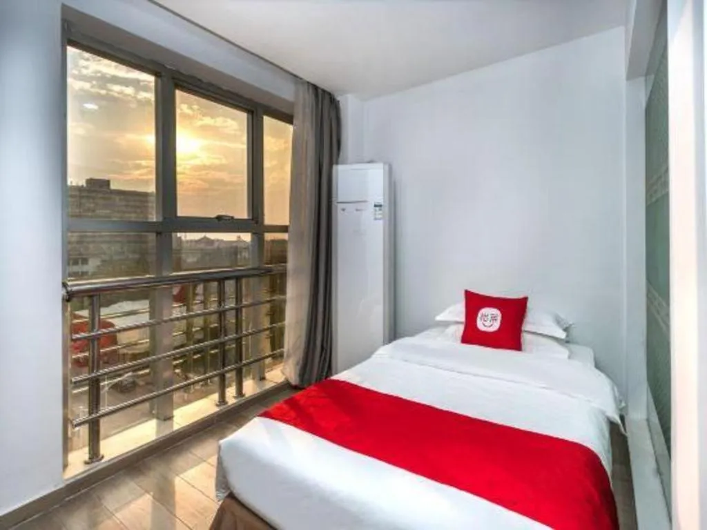 Bed in Nantong GuoDu Hotel