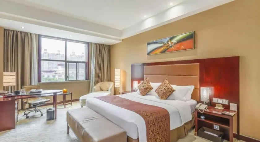 Bed in Zhongzhou International Hotel