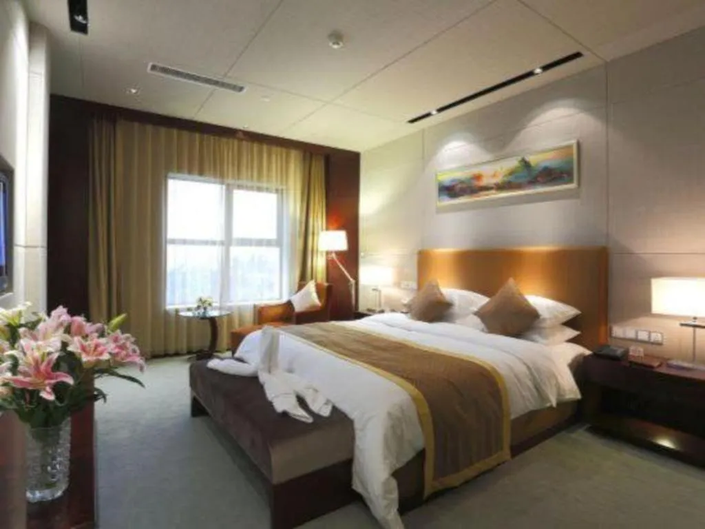 Bed in Zhongzhou International Hotel