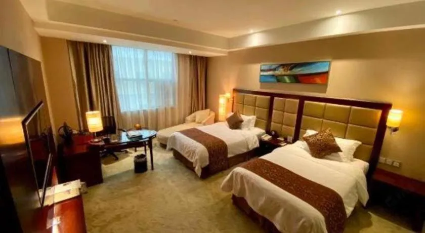 Bed in Zhongzhou International Hotel