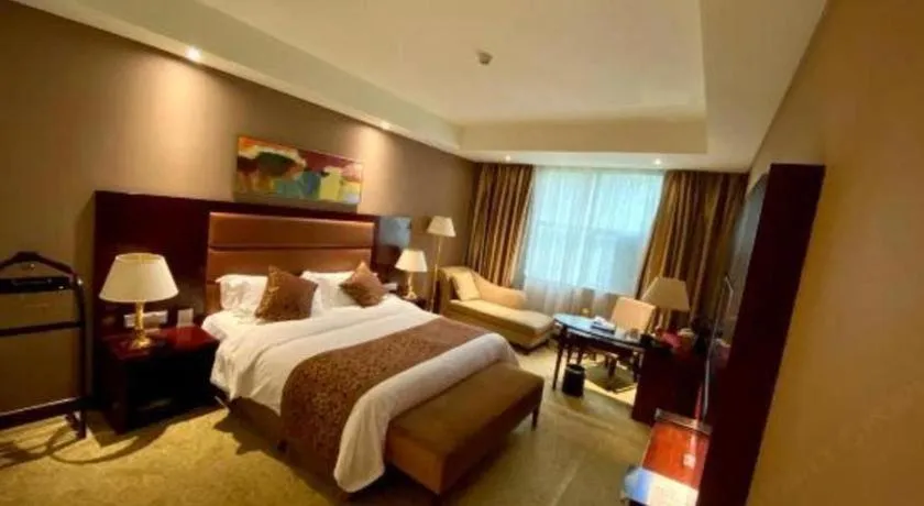 Bed in Zhongzhou International Hotel