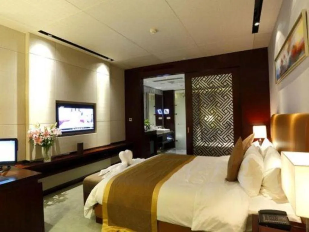 Bed in Zhongzhou International Hotel