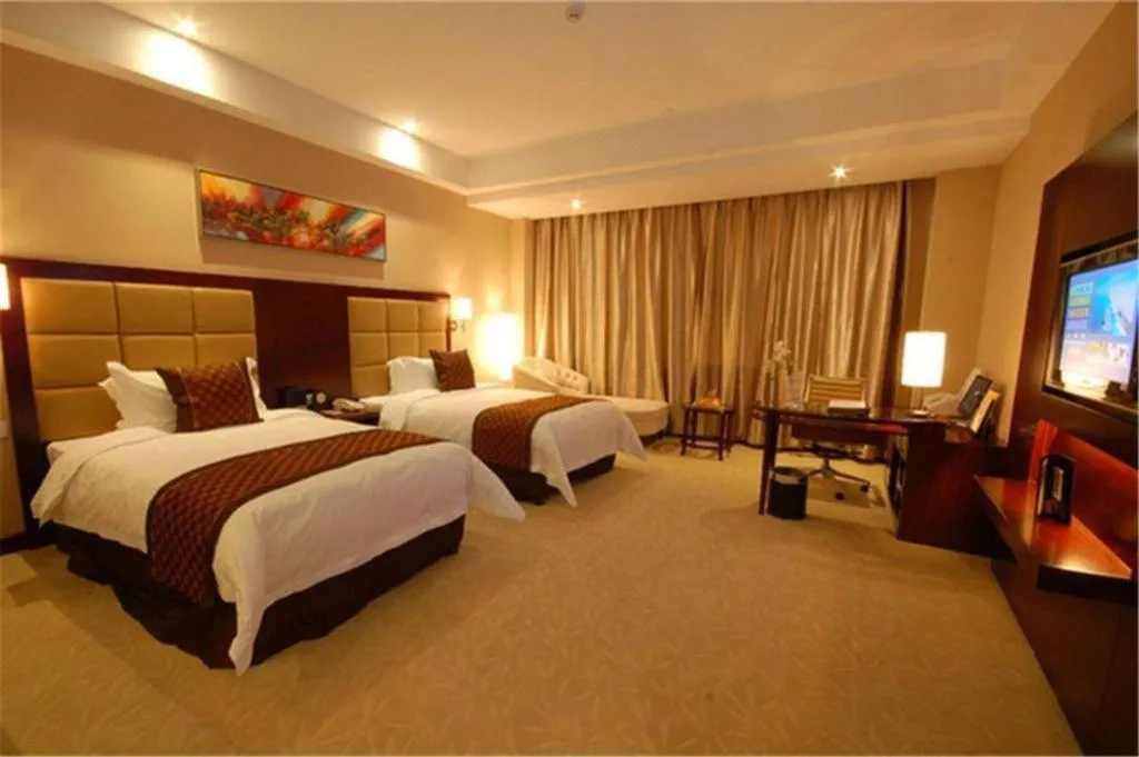 Bed in Zhongzhou International Hotel