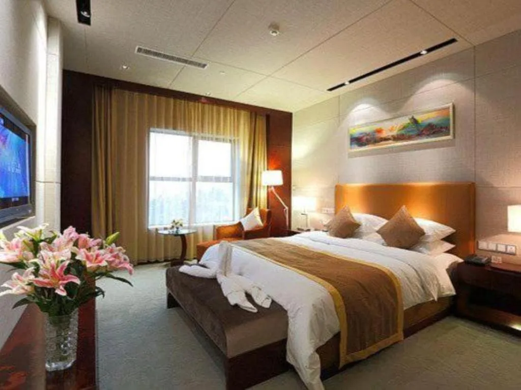 Bed in Zhongzhou International Hotel