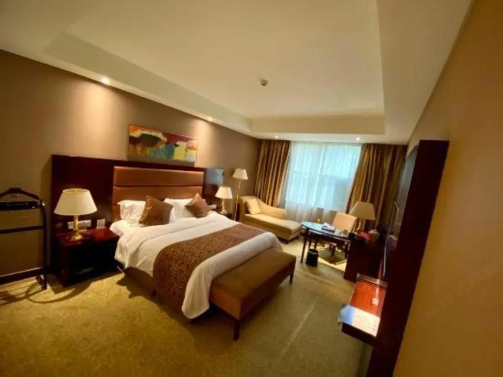 Bed in Zhongzhou International Hotel