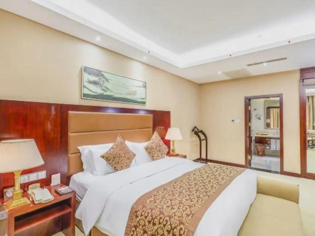 Bed in Zhongzhou International Hotel