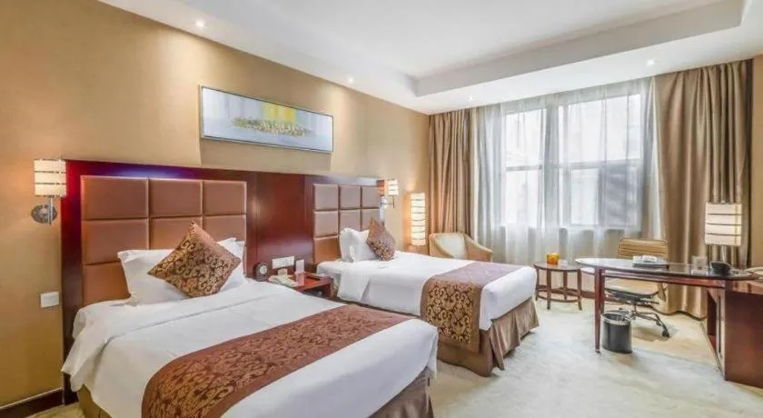 Bed in Zhongzhou International Hotel