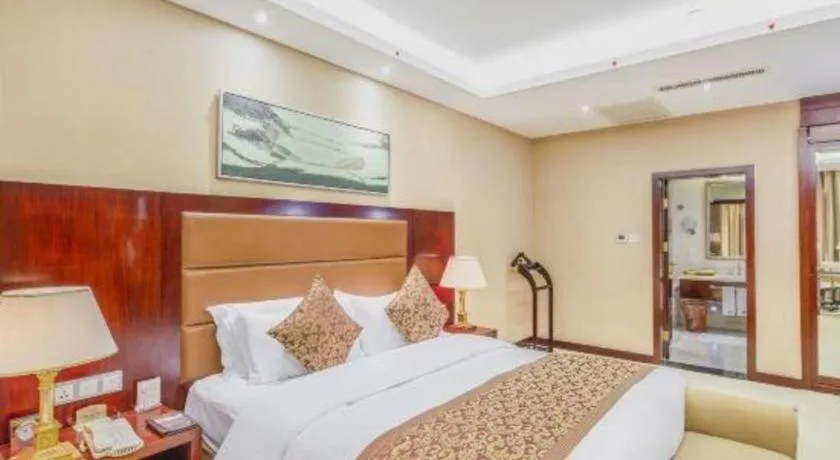 Bed in Zhongzhou International Hotel