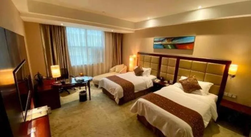 Bed in Zhongzhou International Hotel