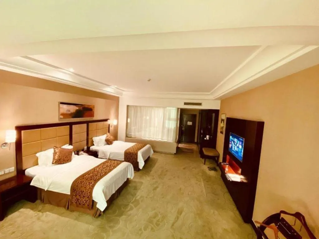 Bed in Zhongzhou International Hotel