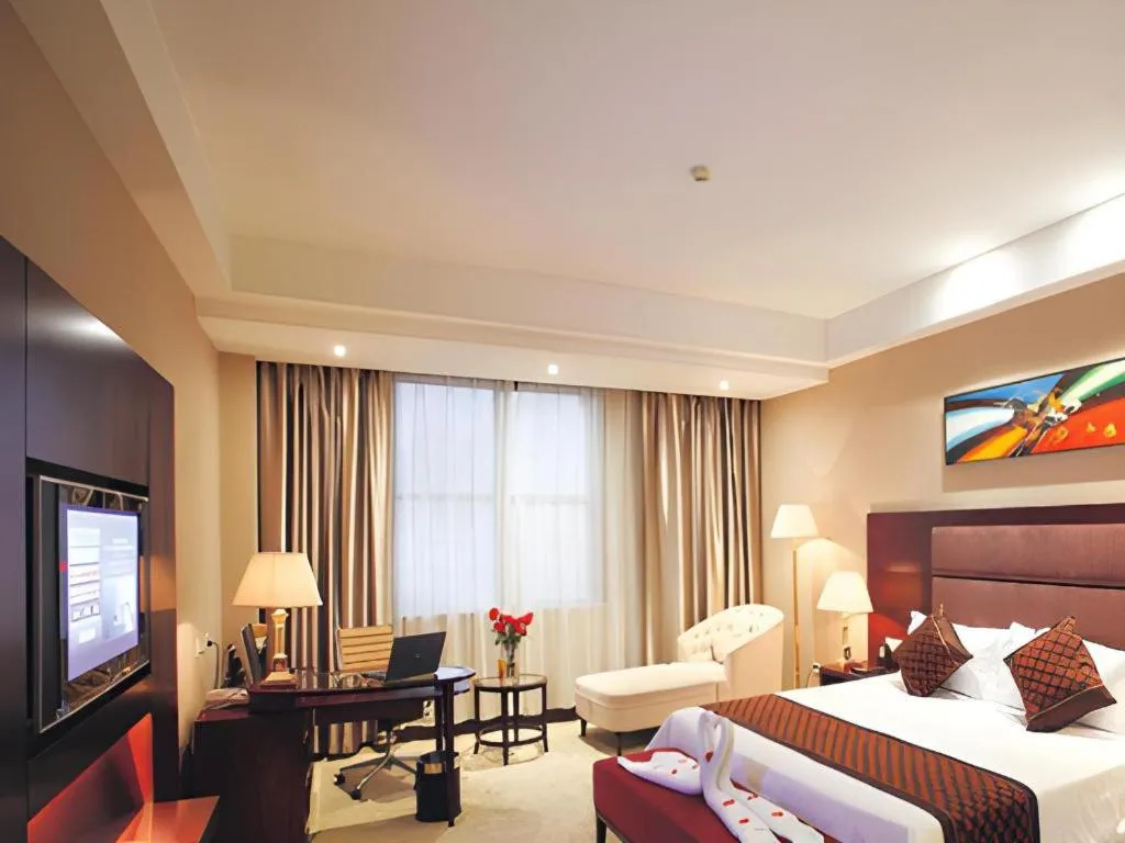 Bed in Zhongzhou International Hotel