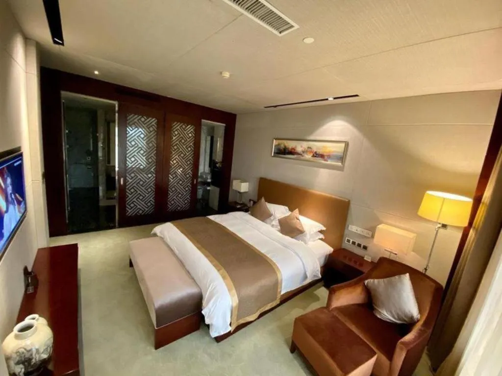 Bed in Zhongzhou International Hotel