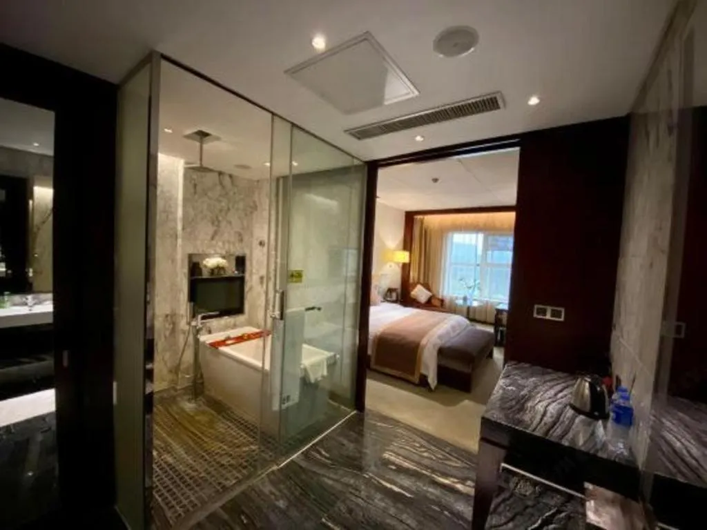 Bed in Zhongzhou International Hotel