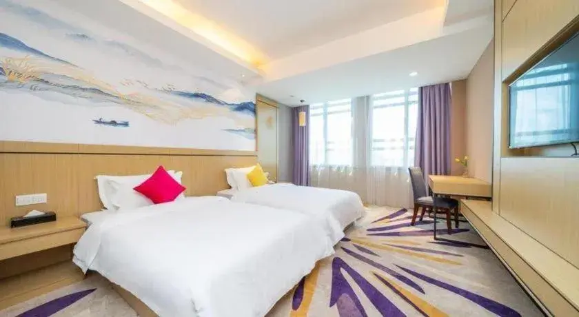 Bed in Wanyi Hotel Bed in Wanyi Hotel