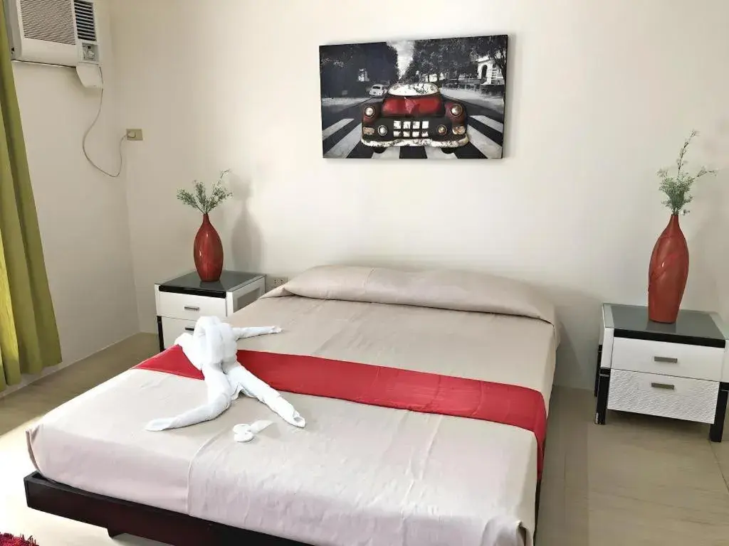 Bed in Quezon Premier Hotel - Candelaria Bed in Quezon Premier Hotel - Candelaria