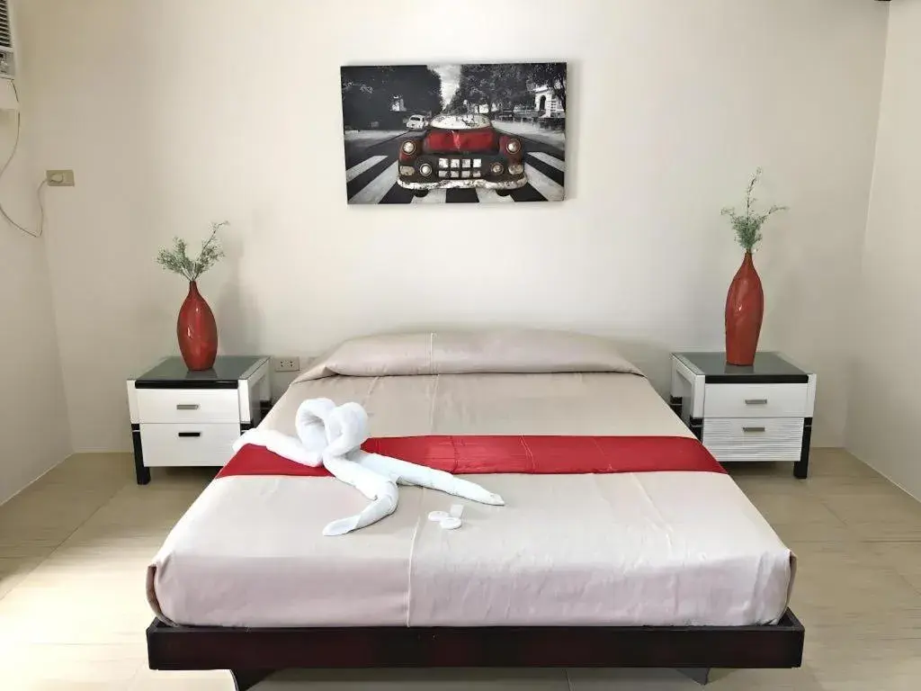 Bed in Quezon Premier Hotel - Candelaria Bed in Quezon Premier Hotel - Candelaria