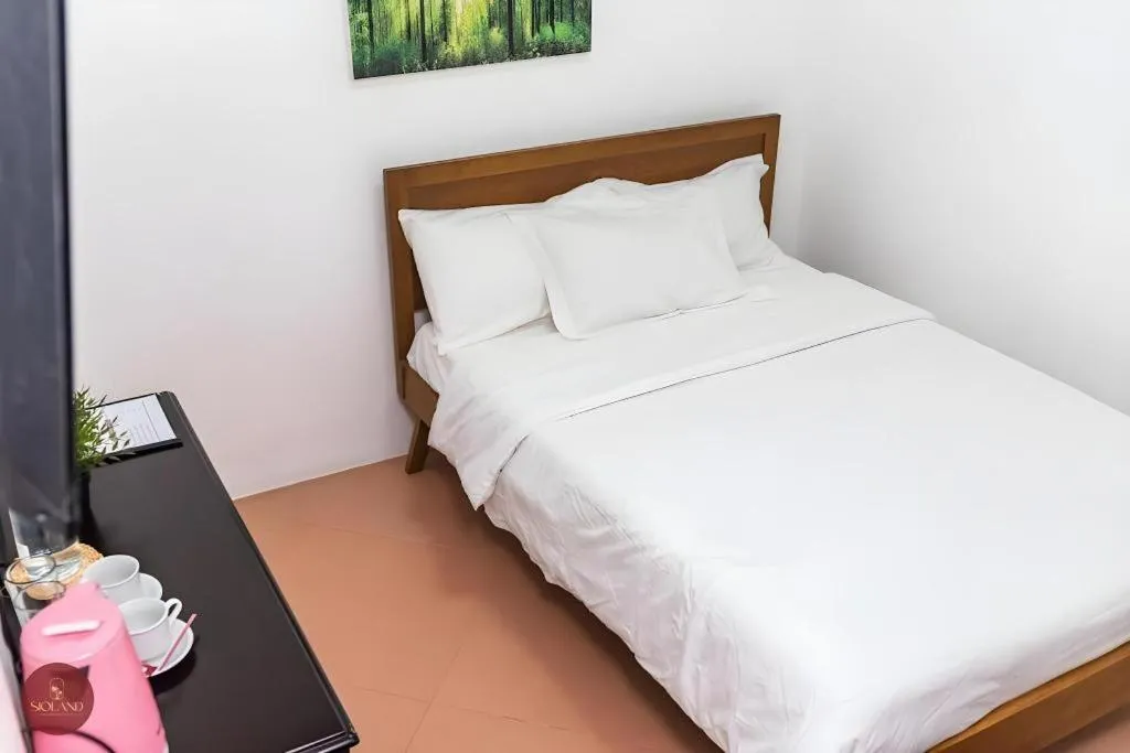 Bed in Sioland Grand Premier Hotel Candelaria