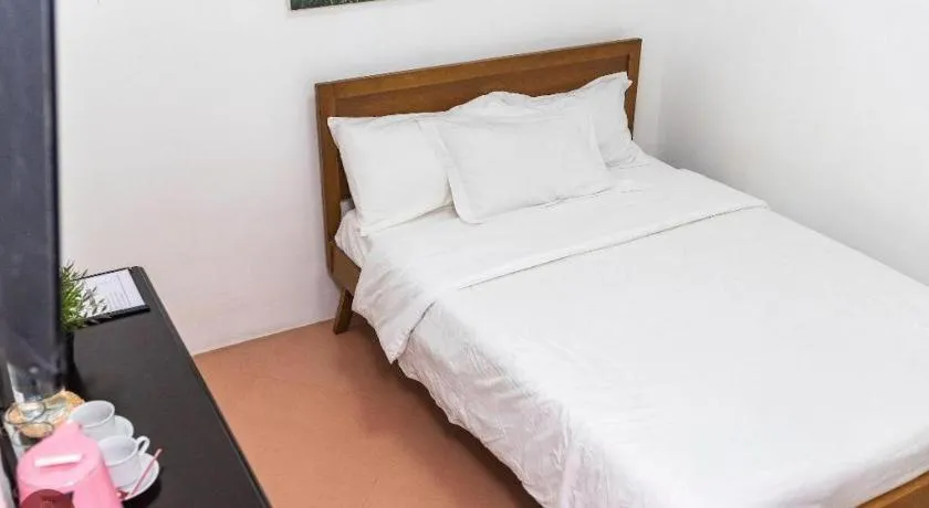 Bed in Quezon Premier Hotel - Candelaria