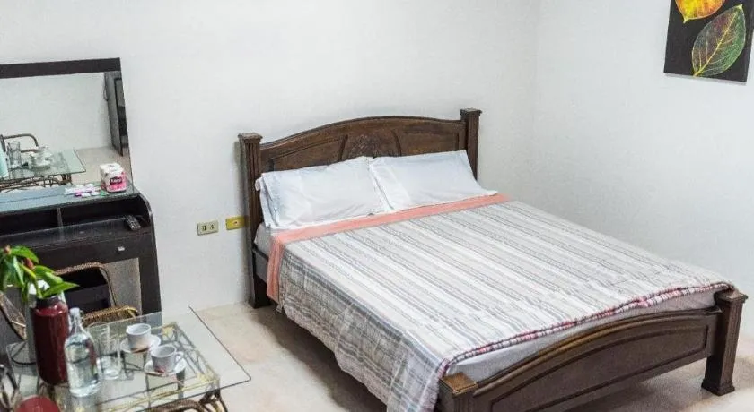 Bed in Quezon Premier Hotel - Candelaria