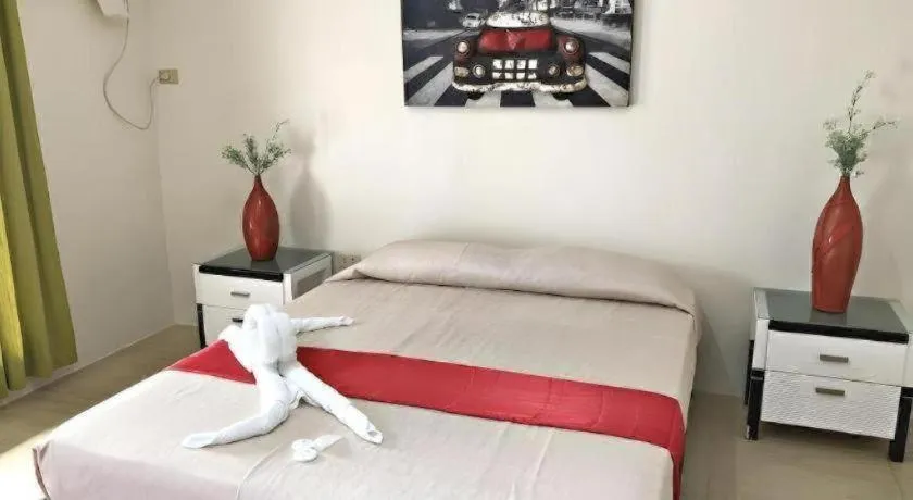 Bed in Quezon Premier Hotel - Candelaria