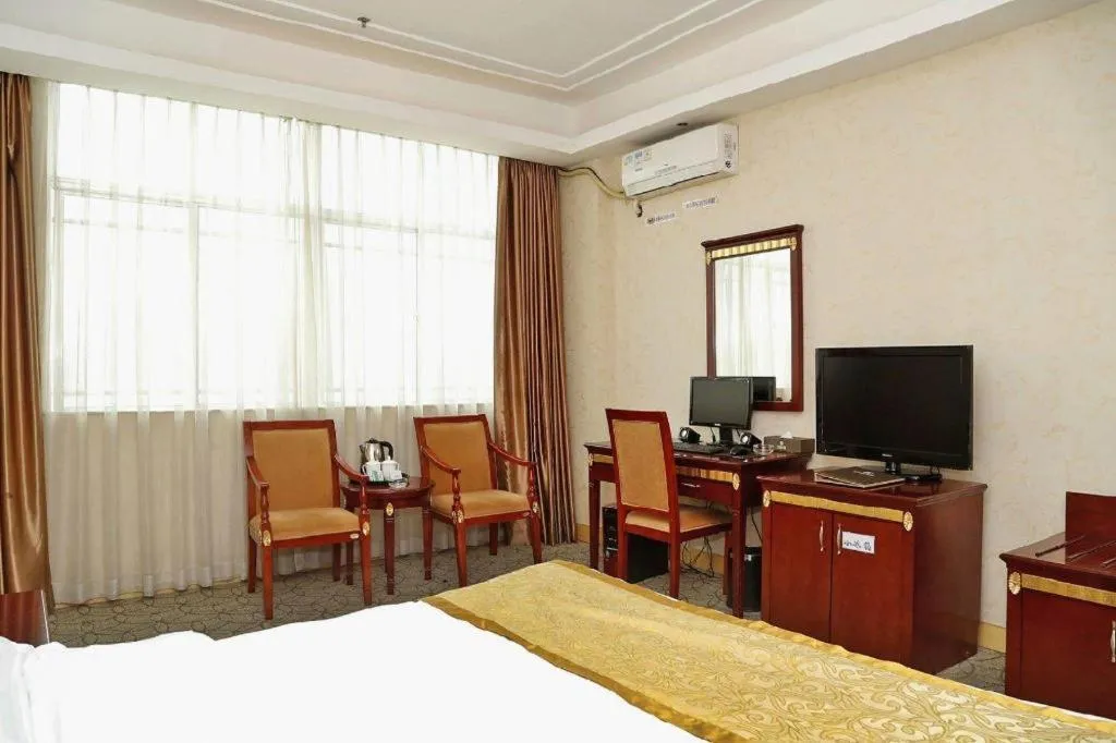 Bed in Shengshi Jinhua Hotel