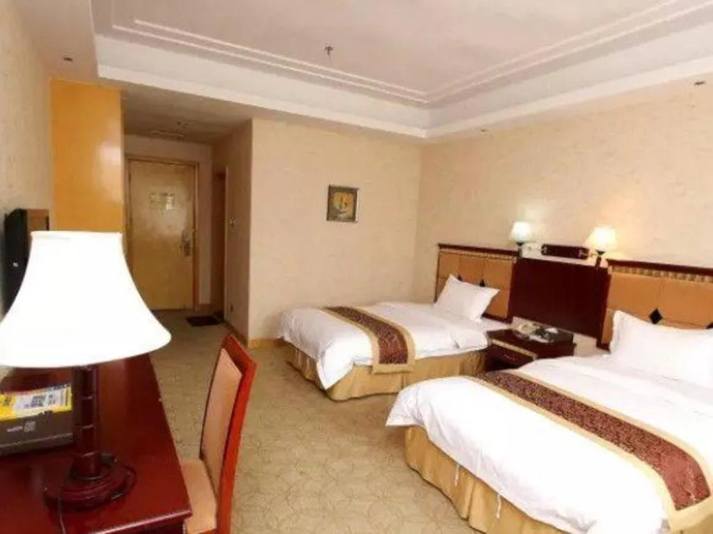 Bed in Shengshi Jinhua Hotel
