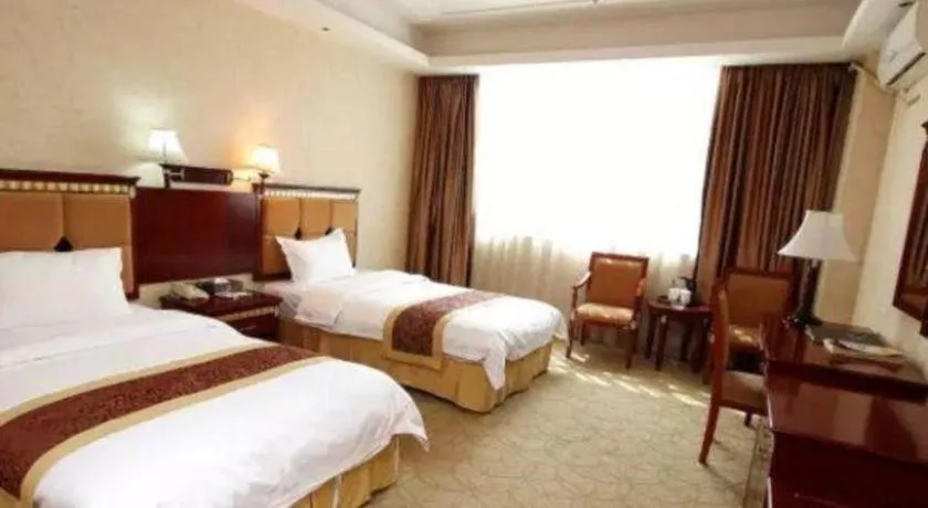 Bed in Shengshi Jinhua Hotel