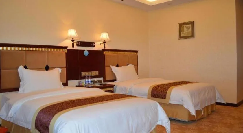 Bed in Shengshi Jinhua Hotel