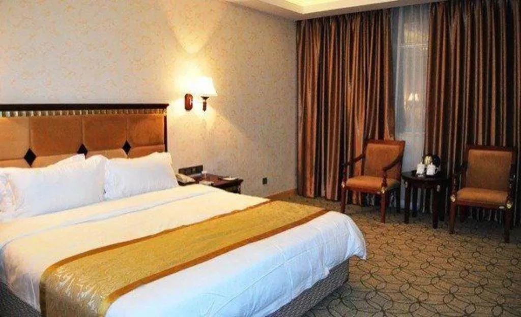 Bed in Shengshi Jinhua Hotel