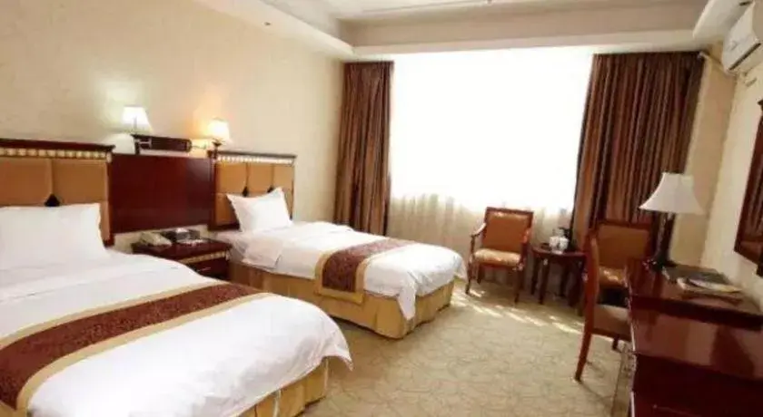 Bed in Shengshi Jinhua Hotel Bed in Shengshi Jinhua Hotel