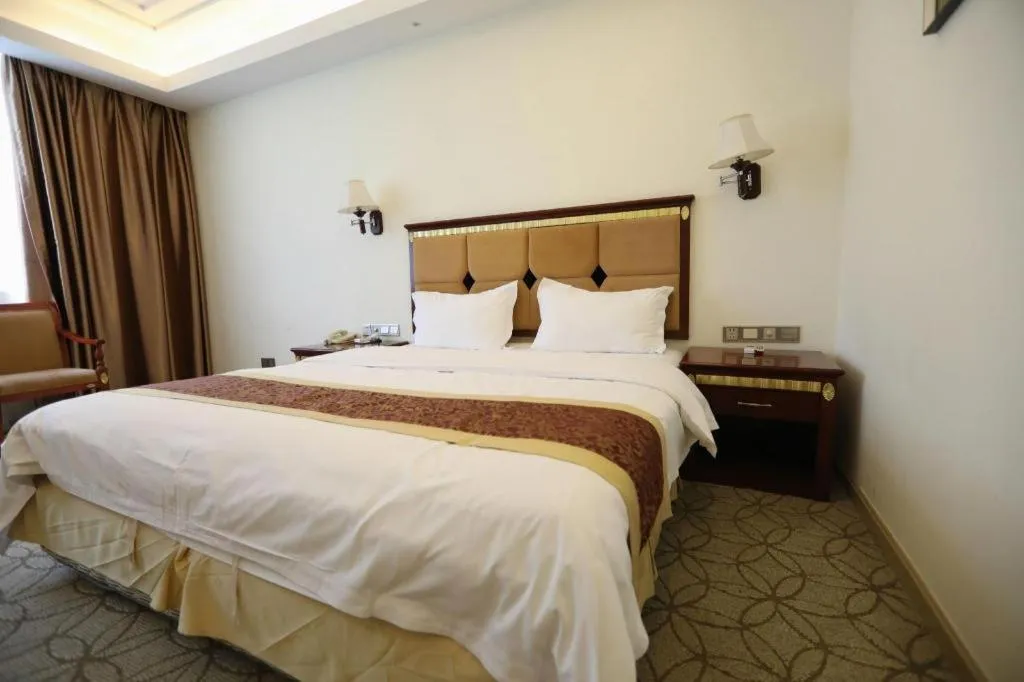 Bed in Shengshi Jinhua Hotel