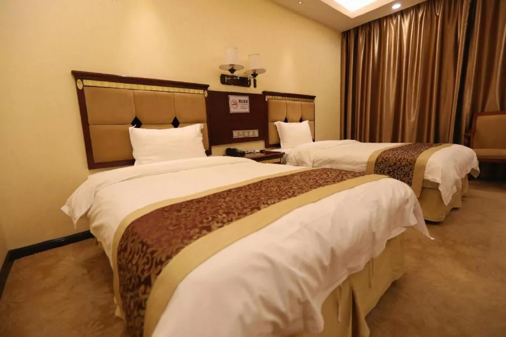 Bed in Shengshi Jinhua Hotel