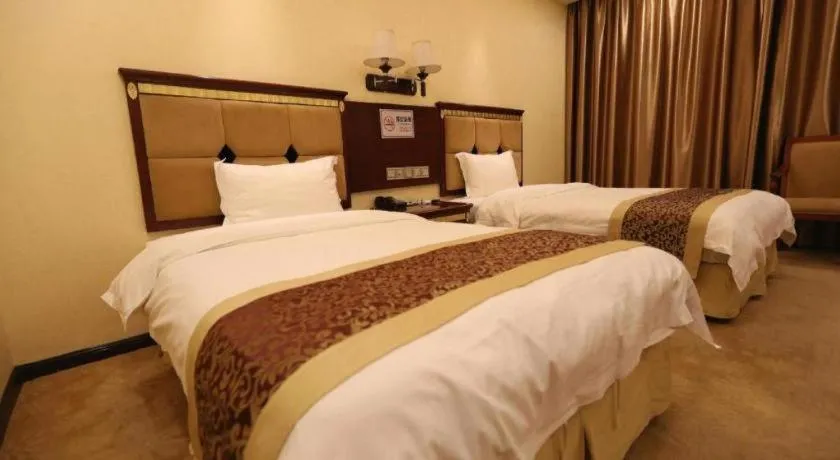 Bed in Shengshi Jinhua Hotel