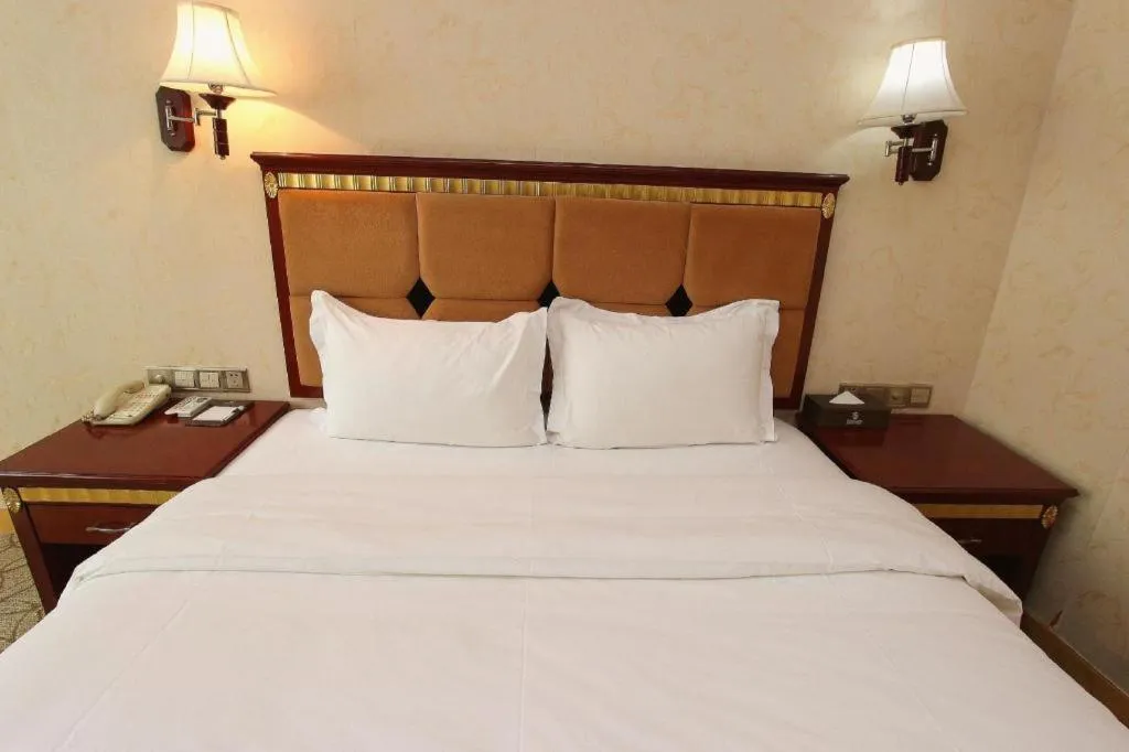 Bed in Shengshi Jinhua Hotel
