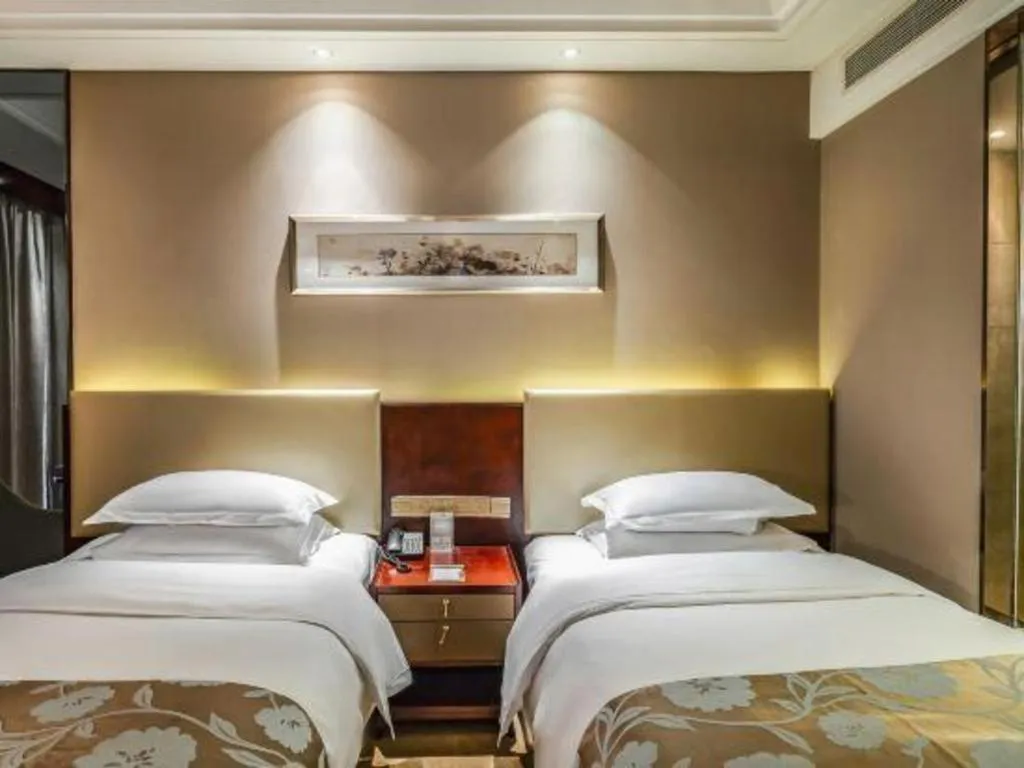 Bed in Zhengzhou Swan City International Hotel